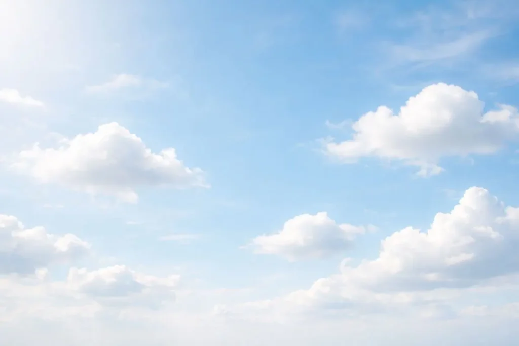 Céu azul com nuvens leves representando pensamentos transitórios.